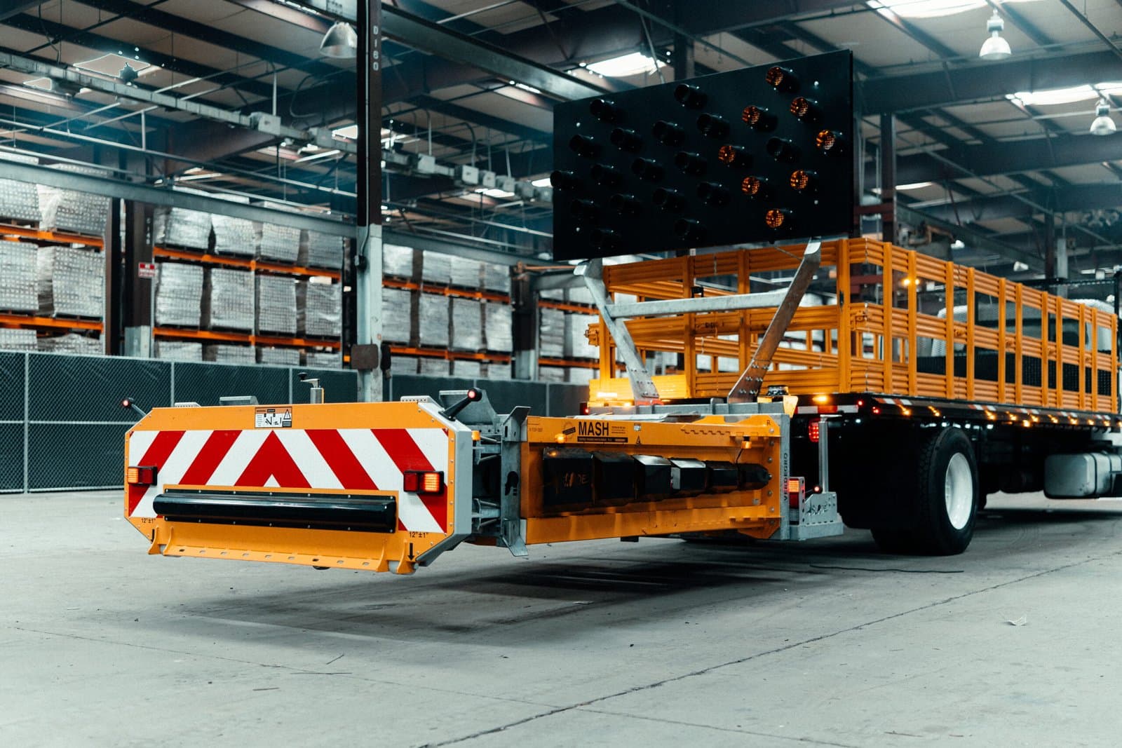 MASH attenuator and message board deployed on a Heartland Fleet + Traffic stake-bed truck